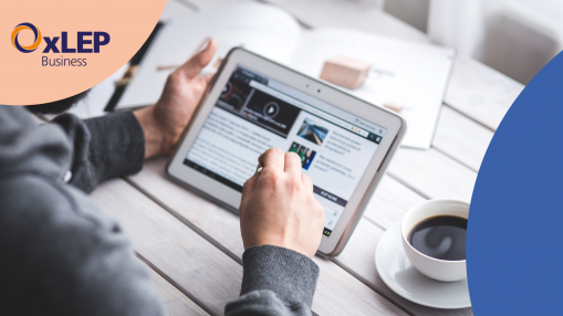 Image of someone using a tablet to look at a website