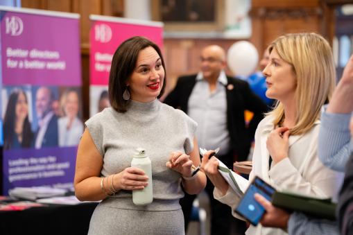 Image of delegates talking at OxLEP Business' Marketplace and Celebration event